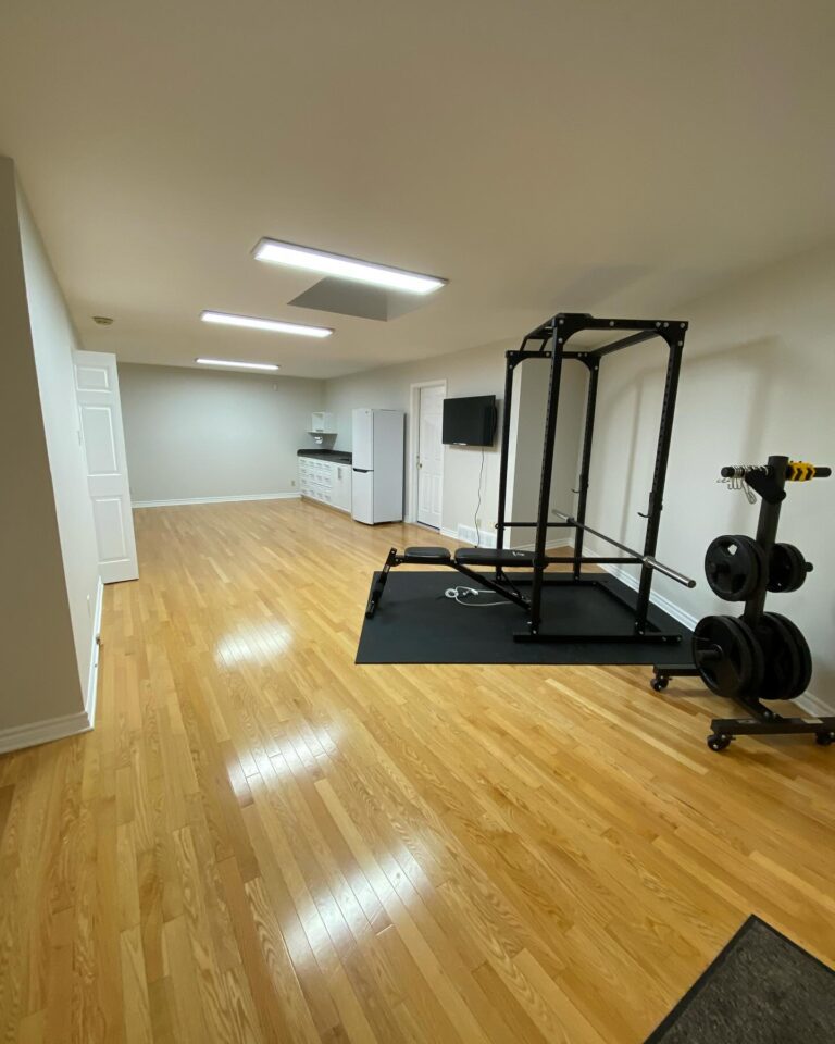 Basement living space wall painting in Ottawa by professional painters"