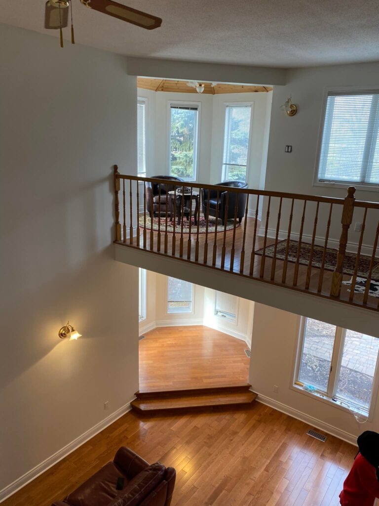 Staircase hallway wall painting in Ottawa by professional painters from Silver Hawk Painting Inc.